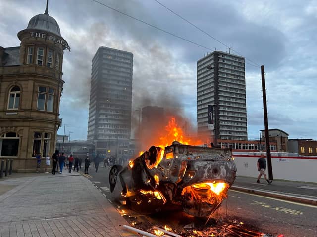 A car is toppled over and set alight during scenes of disorder in Sunderland this evening (FRI), which follows on from rioting in Hartlepool earlier this week after the Southport stabbing tragedy.
