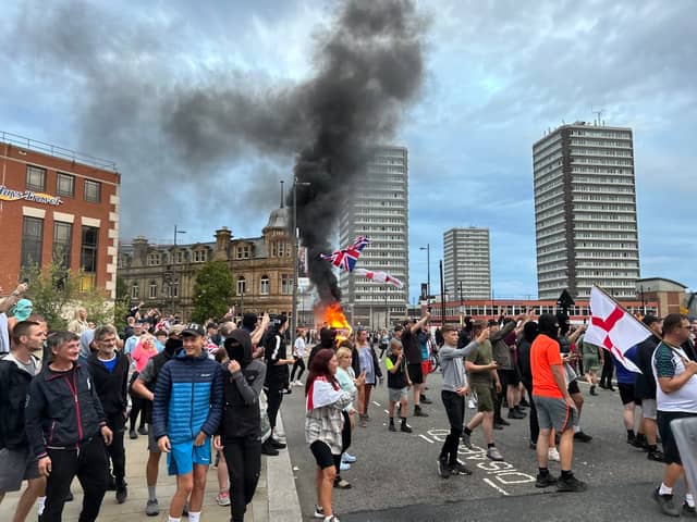 A car is toppled over and set alight during scenes of disorder in Sunderland this evening (FRI), which follows on from rioting in Hartlepool earlier this week after the Southport stabbing tragedy.