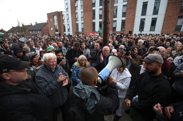 Anti-racism activists gather ahead of a potential anti-immigration protest in Liverpool.
