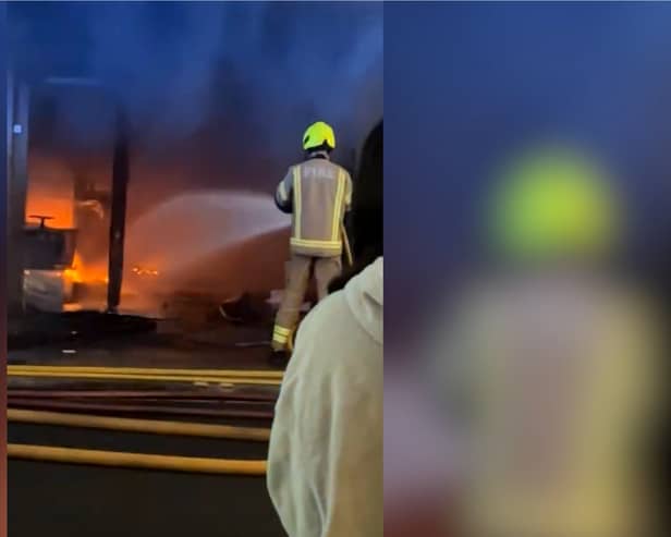 Sixty firefighters tackle blaze at kosher restaurant and flats.