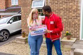 Christina can’t believe amount on cheque presented by ambassador Danyl Johnson