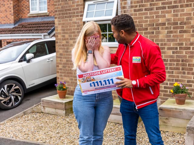 Christina can’t believe amount on cheque presented by ambassador Danyl Johnson