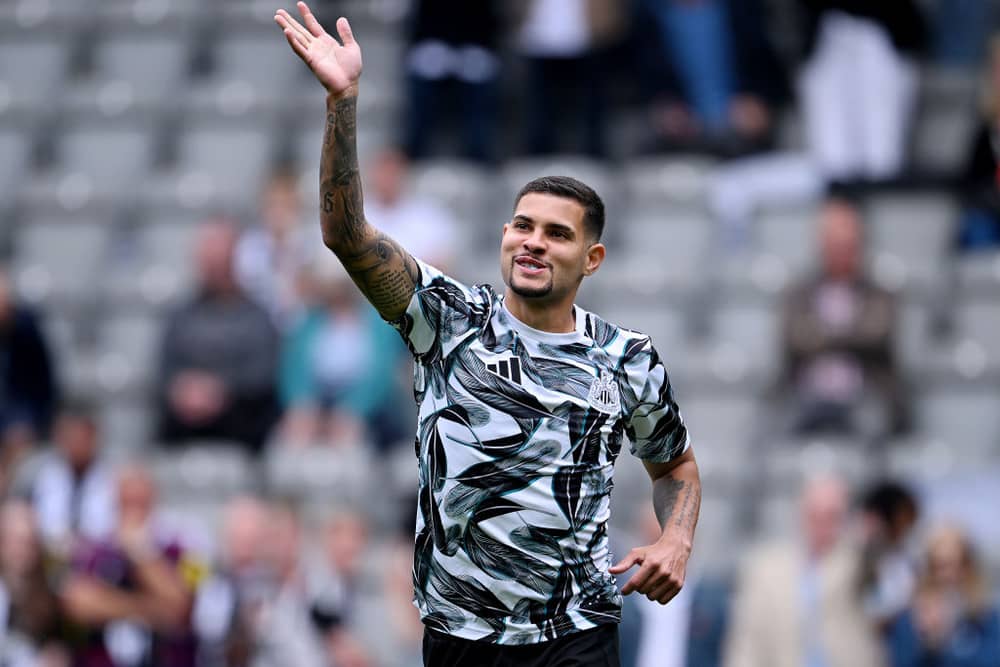 Bruno Guimaraes of Newcastle United waves to the crowd as he warms up prior to the Premier League match between Newcastle United FC and Southampton FC at St James' Park on August 17, 2024 in Newcastle upon Tyne, England. (Photo by Stu Forster/Getty Images)