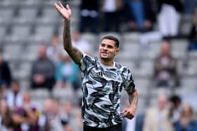 Bruno Guimaraes of Newcastle United waves to the crowd as he warms up prior to the Premier League match between Newcastle United FC and Southampton FC at St James' Park on August 17, 2024 in Newcastle upon Tyne, England. (Photo by Stu Forster/Getty Images)