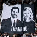 Fans of Newcastle United show their thanks to co-owners Mehrdad Ghodoussi and Amanda Staveley with a flag prior to the Premier League match between Newcastle United FC and Southampton FC at St James' Park on August 17, 2024 in Newcastle upon Tyne, England.