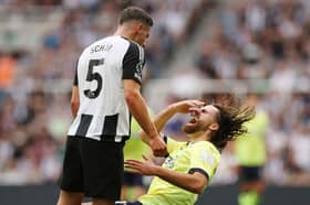 Fabian Schaer of Newcastle clashes with United Ben Brereton Diaz of Southampton