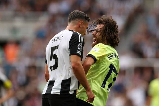 Fabian Schar of Newcastle United clashes with Ben Brereton Diaz of Southampton. (Photo by Ian MacNicol/Getty Images)