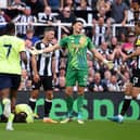 Nick Pope of Newcastle United reacts after teammate Fabian Schaer clashed with Ben Brereton Diaz of Southampton