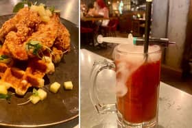 The Alchemist's Chicken & Waffles and Red Dead Zombie cocktail from its ICONS brunch (Photo: Holly Allton)