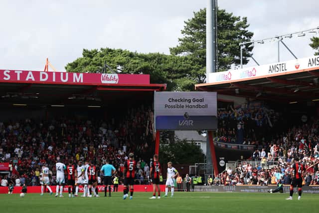 A general view of the inside of the stadium as the LED screen, which reads "Checking Goal Possible Handball", after Dango Ouattara of AFC Bournemouth scored a goal which was later ruled out following a Handball decision following the VAR Review during the Premier League match between AFC Bournemouth and Newcastle United FC at Vitality Stadium on August 25, 2024 in Bournemouth, England. (Photo by Eddie Keogh/Getty Images)
