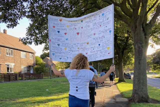 Walkers will carry a banner full of names of loved ones who have been lost to suicide.