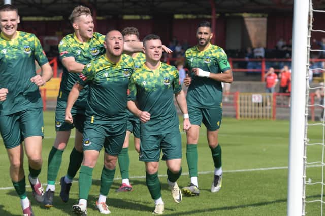 Hebburn Town celebrate after Joe Posthill scores the goal that gave them a 1-0 win in an FA Cup first qualifying round tie at Workington (photo Tyler Lopes)