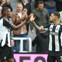 Alexander Isak of Newcastle United celebrates scoring his team's second goal with teammate Bruno Guimaraes during the Premier League match between Newcastle United FC and Tottenham Hotspur FC at St James' Park on September 01, 2024 in Newcastle upon Tyne, England. (Photo by Matt McNulty/Getty Images)