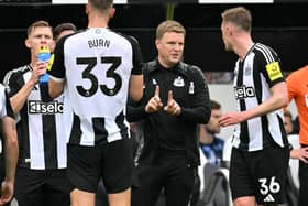 Newcastle United's English head coach Eddie Howe speaks with Newcastle United's English midfielder #36 Sean Longstaff during a break in play during the English Premier League football match between Newcastle United and Tottenham Hotspur at St James' Park in Newcastle-upon-Tyne, north east England on September 1, 2024. (Photo by ANDY BUCHANAN / AFP)