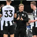 Newcastle United's English head coach Eddie Howe speaks with Newcastle United's English midfielder #36 Sean Longstaff during a break in play during the English Premier League football match between Newcastle United and Tottenham Hotspur at St James' Park in Newcastle-upon-Tyne, north east England on September 1, 2024. (Photo by ANDY BUCHANAN / AFP)