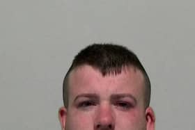 Aaron Giles a convict serving 15 years after a gunman blasted a shotgun at a front door has been given extra time behind bars for drug dealing.