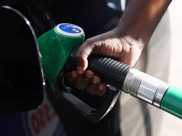 A driver pumps fuel at an Esso Tesco petrol station in 2022 (Photo: Hollie Adams/Getty Images)