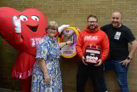 Councillor Tracey Dixon is pictured with Sergio Petrucci of Red Sky Foundation and Peter Darrant of Out North East with the new Pride themed defibrillator in South Marine Park, South Shields.