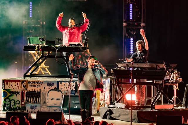 HOLLYWOOD, CA - OCTOBER 27: Musicians from Linkin Park; Brad Delsen, Mike Shinoda and Joe Hahn perform during the "Linkin Park And Friends Celebrate Life In Honor Of Chester Bennington" concert at the Hollywood Bowl on October 27, 2017 in Hollywood, California.