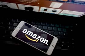 Amazon app seen on a mobile phone. Photo by Edward Smith/Getty Images
