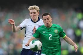 England and Newcastle United star Anthony Gordon (left) challenges former Everton teammate Seamus Coleman