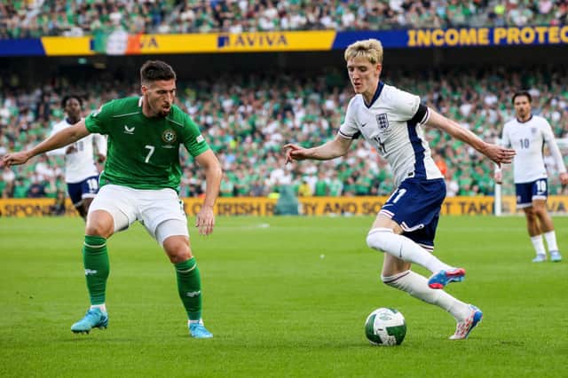 Anthony Gordon vies for the ball with Matt Doherty during the UEFA Nations League match between Ireland and England at the Aviva Stadium