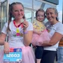 Brave teen Jessica Bootes, 14, pictured with her mum Lisa Bootes and Robyn after finishing the race.