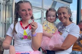 Brave teen Jessica Bootes, 14, pictured with her mum Lisa Bootes and Robyn after finishing the race.