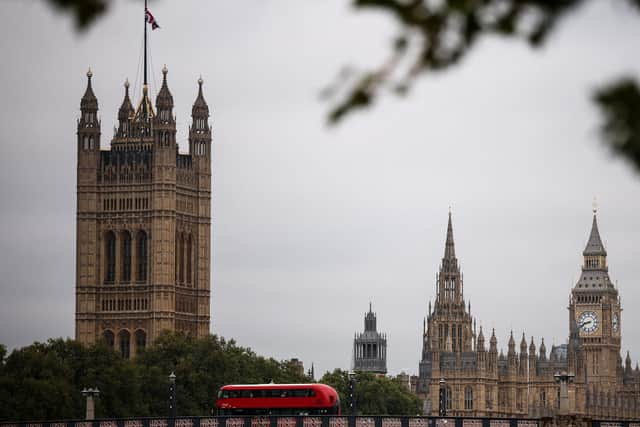 The Palace of Westminster, home to the Houses of Parliament, in the background, in central London, where a vote on the winter fuel allowance took place on Tuesday.