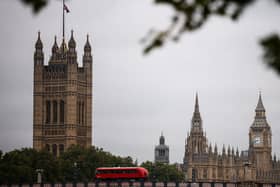 The Palace of Westminster, home to the Houses of Parliament, in the background, in central London, where a vote on the winter fuel allowance took place on Tuesday.