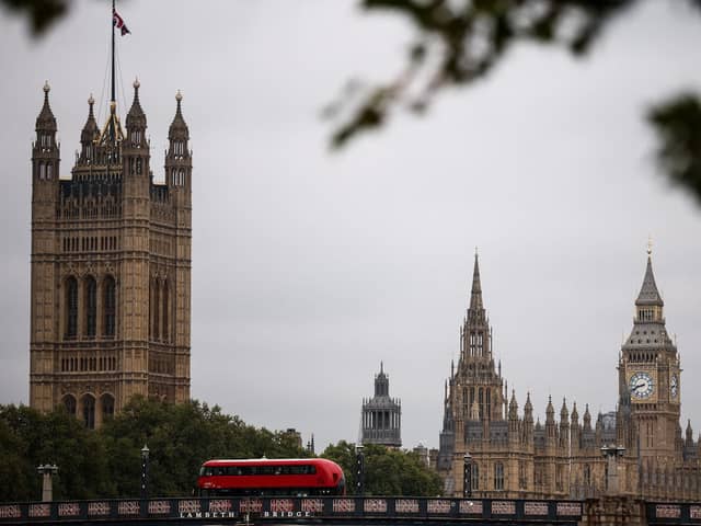 The Palace of Westminster, home to the Houses of Parliament, in the background, in central London, where a vote on the winter fuel allowance took place on Tuesday.