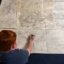 Jake Daniels-Shipsmith with his incredible city map which he has been working on for seven years. 