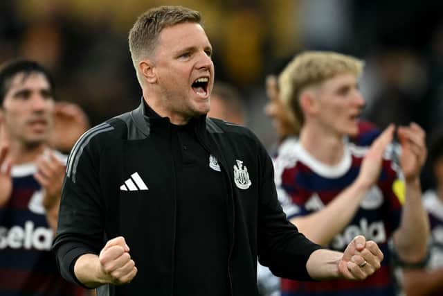 Newcastle United's English head coach Eddie Howe celebrates after the English Premier League football match between Wolverhampton Wanderers and Newcastle United at the Molineux stadium in Wolverhampton, central England on September 15, 2024. (Photo by JUSTIN TALLIS / AFP)