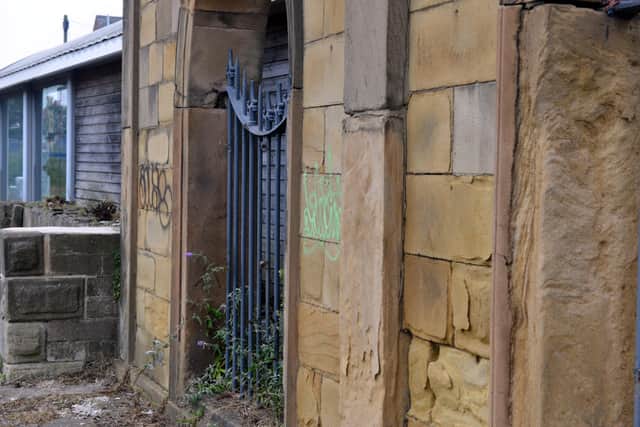 Graffiti on the Grade II listed Fans' Museum building.