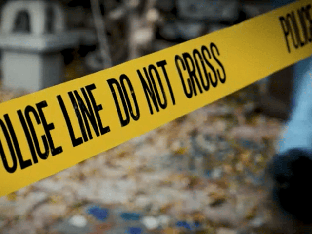 Police tape across crime scene