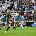 Newcastle United's English midfielder #10 Anthony Gordon scores their first goal from the penalty spot during the English Premier League football match between Newcastle United and Manchester City at St James' Park in Newcastle-upon-Tyne, north-east England on September 28, 2024. (Photo by Oli SCARFF / AFP) 