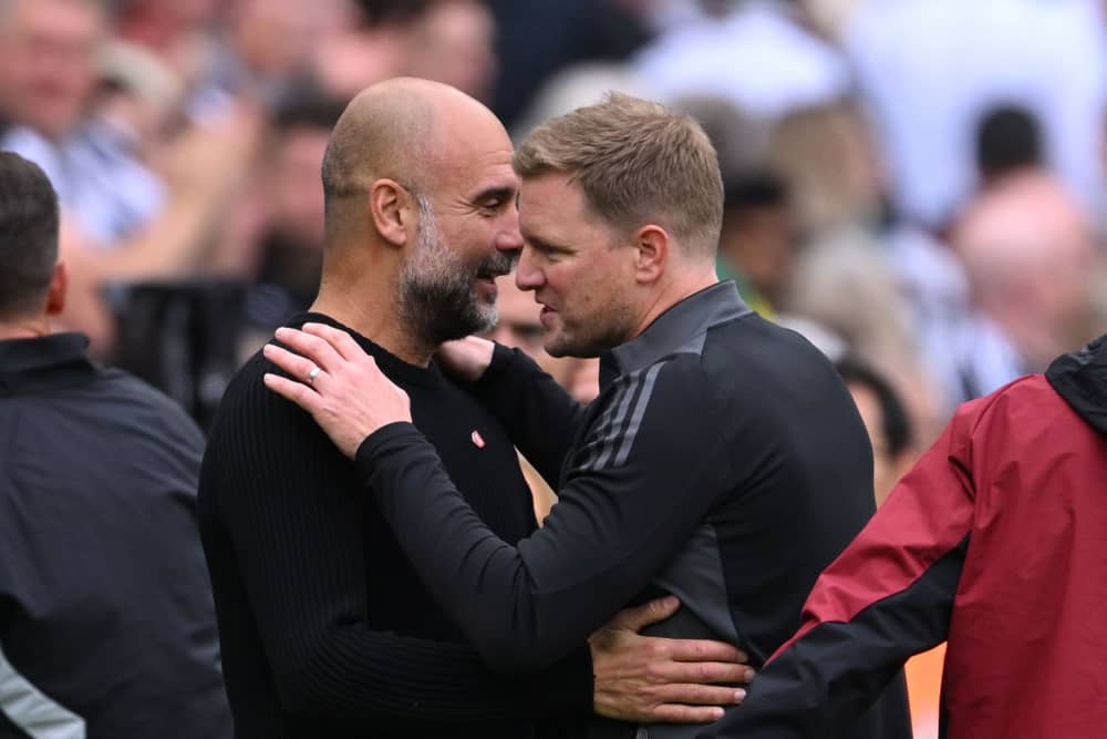 Manchester City manager Pep Guardiola and Newcastle United head coach Eddie Howe. (Photo by Stu Forster/Getty Images)