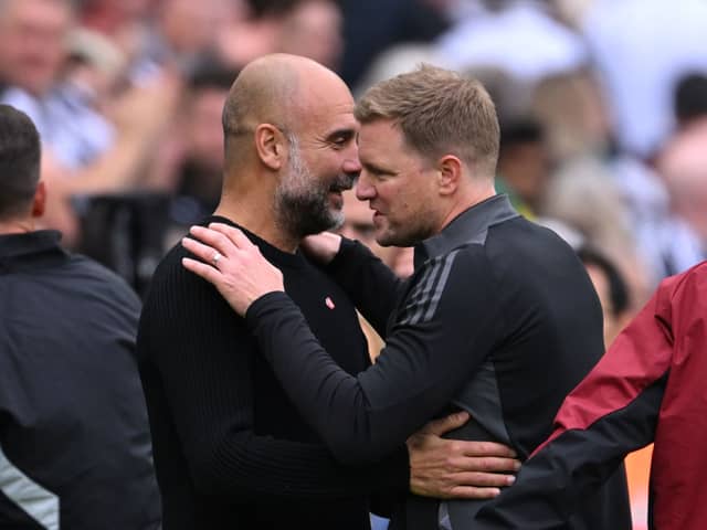 Manchester City manager Pep Guardiola and Newcastle United head coach Eddie Howe. (Photo by Stu Forster/Getty Images)