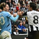 Manchester City''s Jack Grealish and Newcastle United's Sandro Tonali. (Photo by OLI SCARFF/AFP via Getty Images)