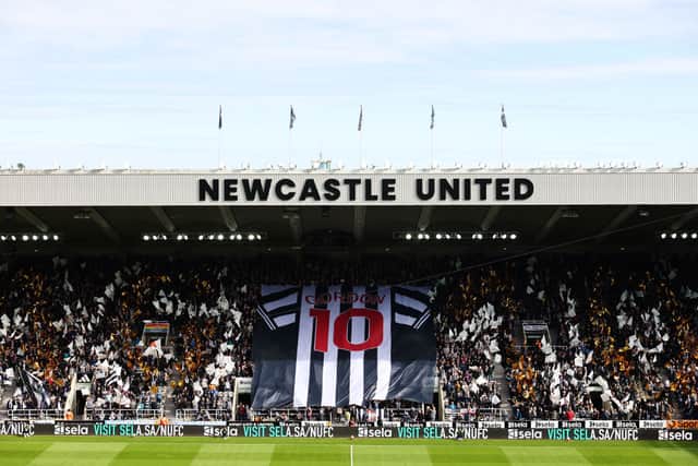 General view inside the stadium as fans hold a flag featuring the shirt of Anthony Gordon of Newcastle United prior to the Premier League match between Newcastle United FC and Manchester City FC at St James' Park on September 28, 2024 in Newcastle upon Tyne, England. (Photo by Matt McNulty/Getty Images)