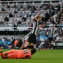 Anthony Gordon fouled by Ederson during Newcastle United's clash with Manchester City