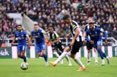 Fabian Schar of Newcastle United scores his team's first goal from the penalty spot during the Carabao Cup Third Round match between Newcastle United and AFC Wimbledon at The Cherry Red Records Stadium on October 01, 2024 in Wimbledon, England. (Photo by George Wood/Getty Images)
