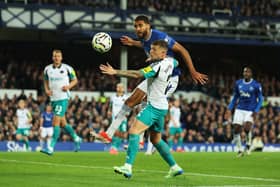 Dominic Calvert-Lewin of Everton is challenged by Kieran Trippier of Newcastle United during the Premier League match between Everton FC and Newcastle United FC at Goodison Park on October 05, 2024 in Liverpool, England. (Photo by Matt McNulty/Getty Images)