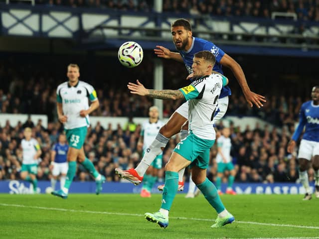 Dominic Calvert-Lewin of Everton is challenged by Kieran Trippier of Newcastle United during the Premier League match between Everton FC and Newcastle United FC at Goodison Park on October 05, 2024 in Liverpool, England. (Photo by Matt McNulty/Getty Images)