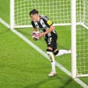 Johnny Emerson of Newcastle United U21 collects the ball after scoring his teams first goal during the Bristol Street Motors Trophy match between Rotherham United and Newcastle United U21 at AESSEAL New York Stadium on October 08, 2024 in Rotherham, England. (Photo by George Wood/Getty Images)