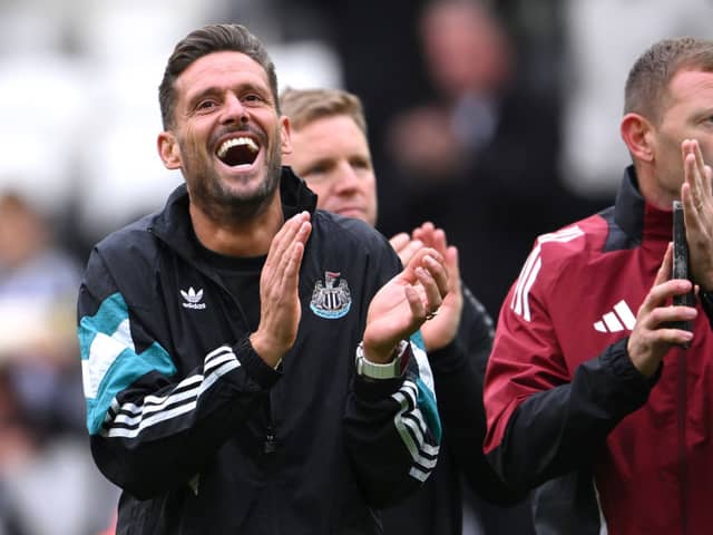 Newcastle United assistant Jason Tindall laughs as Graeme Jones (r) applauds after the Premier League match between Newcastle United FC and Manchester City FC at St James' Park on September 28, 2024 in Newcastle upon Tyne, England. (Photo by Stu Forster/Getty Images)