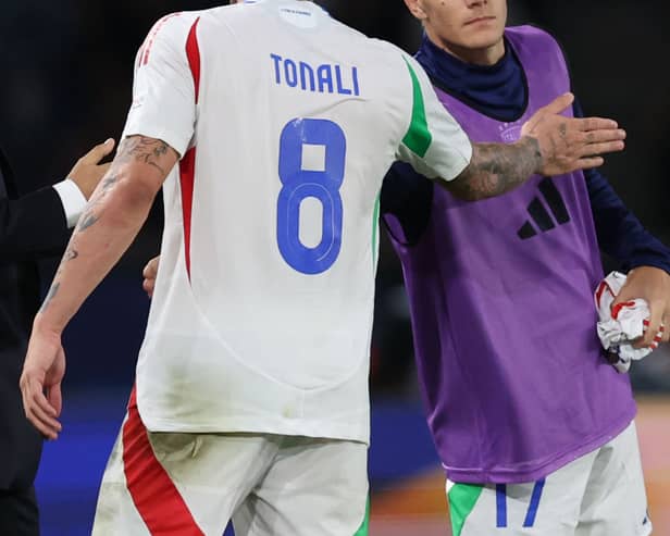 Sandro Tonali of Italy greets Nicolo Fagioli of Italy at the end of the match during the UEFA Nations League 2024/25 League A Group A2 match between France and Italy at  on September 06, 2024 in Paris, France. (Photo by Claudio Villa/Getty Images)