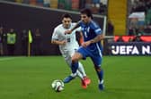 Italy's midfielder #08 Sandro Tonali (C, r) fights for the ball with Israel's midfielder #15 Oscar Gloukh (C, l) during the UEFA Nations League, Ligue A Group A2 football match between Italy and Israel at the Friuli stadium in Udine, on October 14, 2024. (Photo by Tiziana FABI / AFP) (Photo by TIZIANA FABI/AFP via Getty Images)