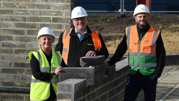 On site at Hebburn New Town: Cllr Liz McHugh Lead Member for Children, Families and Social care and Education and Skills at South Tyneside Council; Grant Watson, Construction Manager at Esh; Adam Cockburn, Site Manager at Esh.