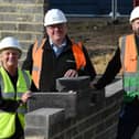 On site at Hebburn New Town: Cllr Liz McHugh Lead Member for Children, Families and Social care and Education and Skills at South Tyneside Council; Grant Watson, Construction Manager at Esh; Adam Cockburn, Site Manager at Esh.